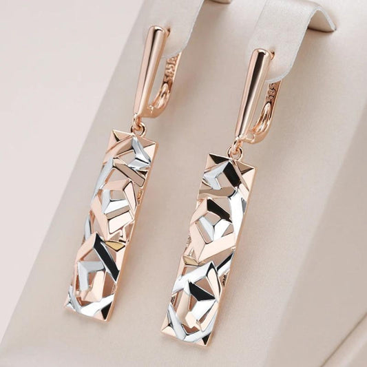 Elegante geometrische Ohrringe aus Roségold und Silber