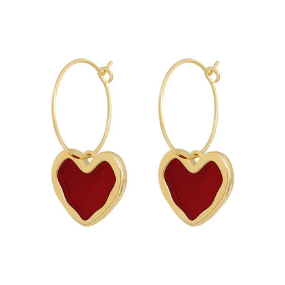 Herz-Ohrringe in Gold